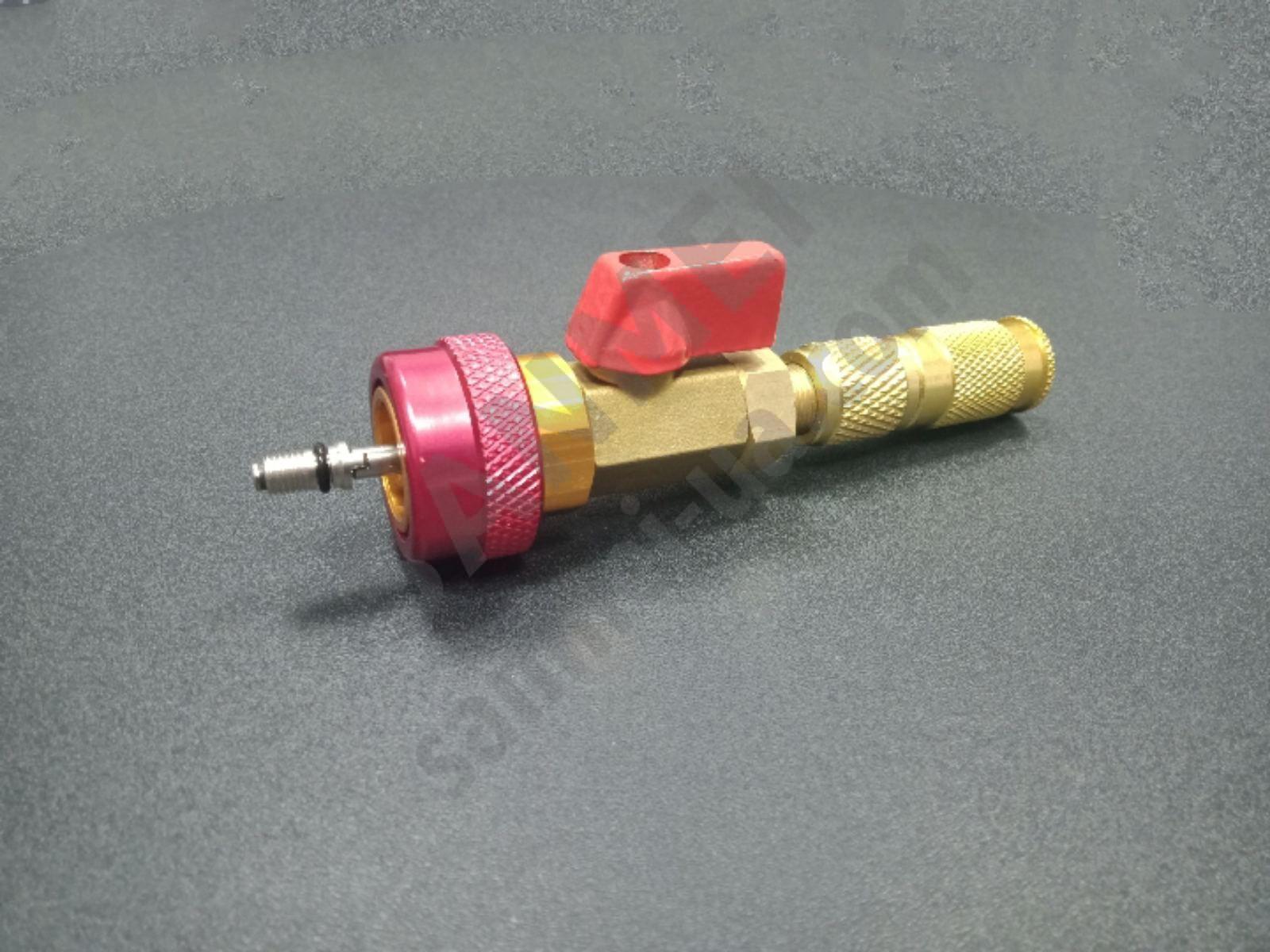 Знімач для заміни ніпеля, золотника під високим тиском